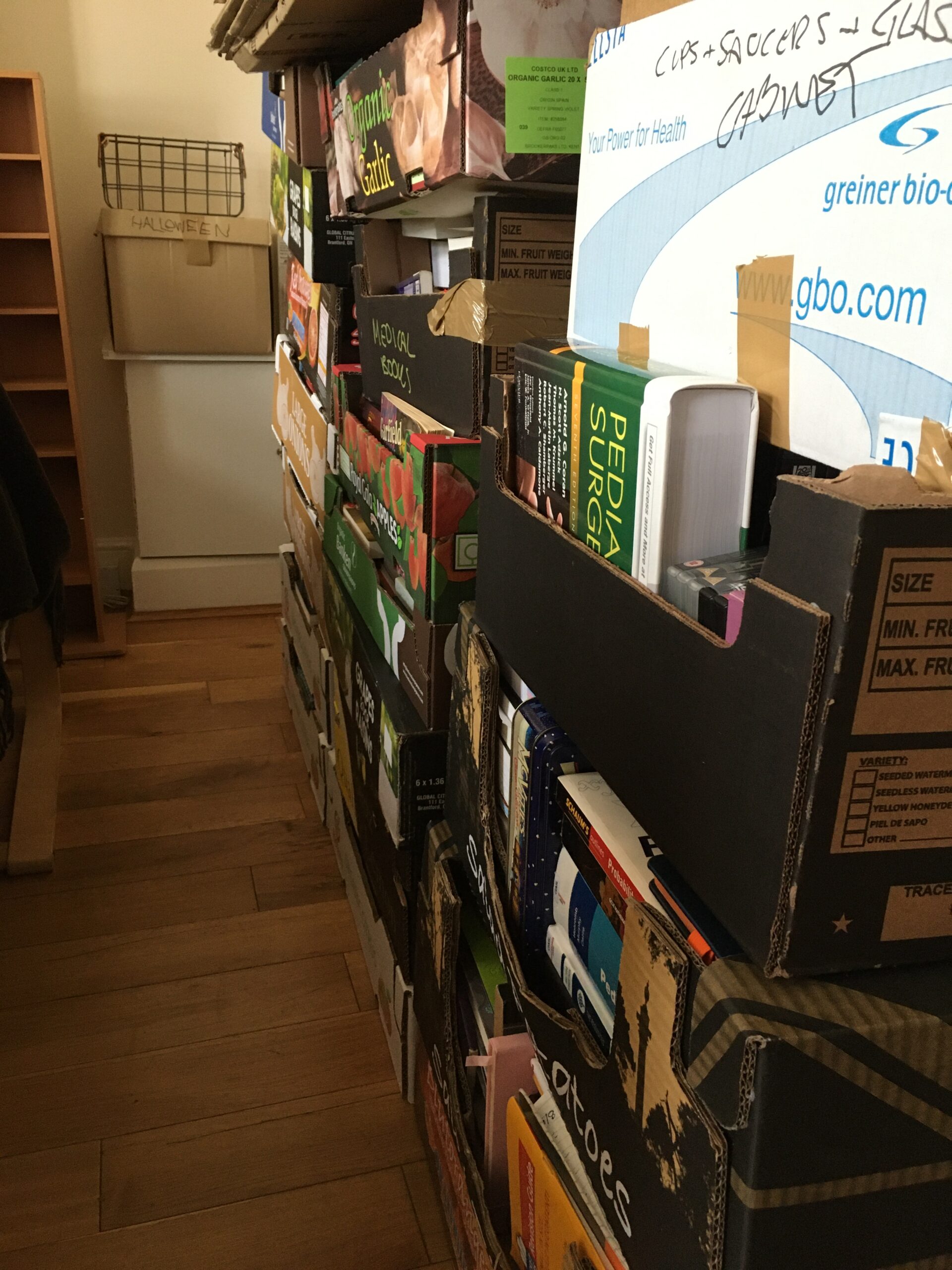 Boxes full of books ready to go, for housemoving day